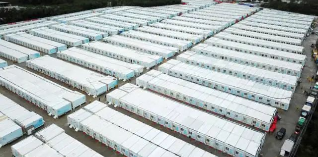 冲锋一线显担任！J9集团智能挖掘机助力长沙方舱医院建设